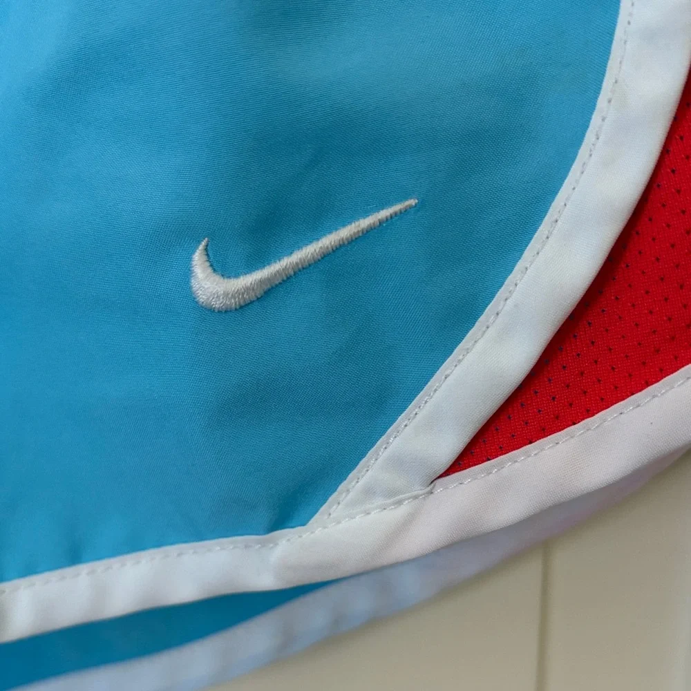 Nike Girl's Athletic Shorts in Blue and Red